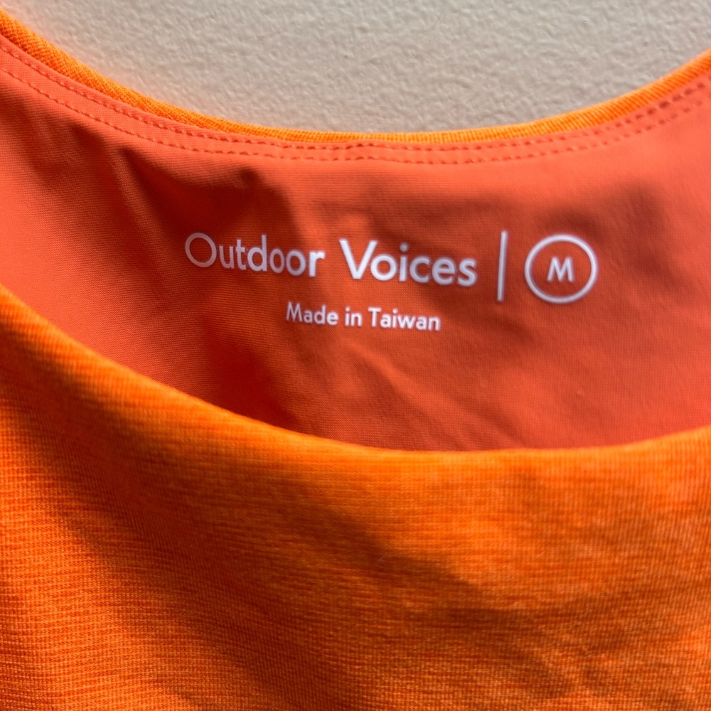 Outdoor Voices Court Cutout Tennis Dress in the color Clementine - Picture 5 of 6